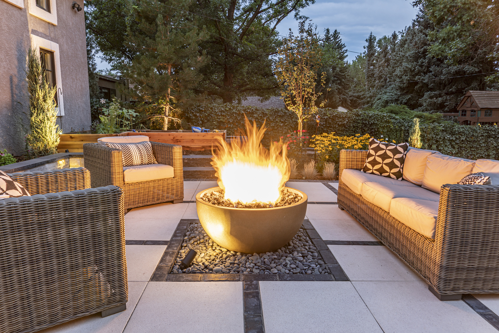 Should I Install an Outdoor Fireplace or Firepit - JT Landscaping