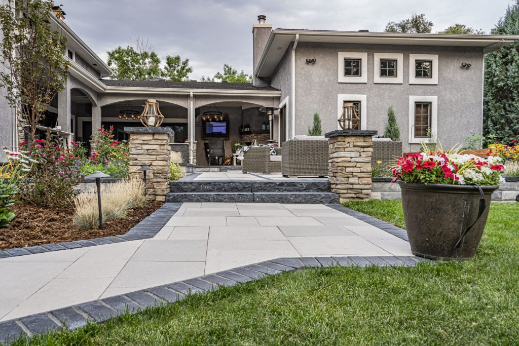 Outdoor living space in Colorado Springs with flagstone patio and professionally designed landscaping
